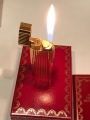 Зажигалка Cartier позолоченная с изумрудами